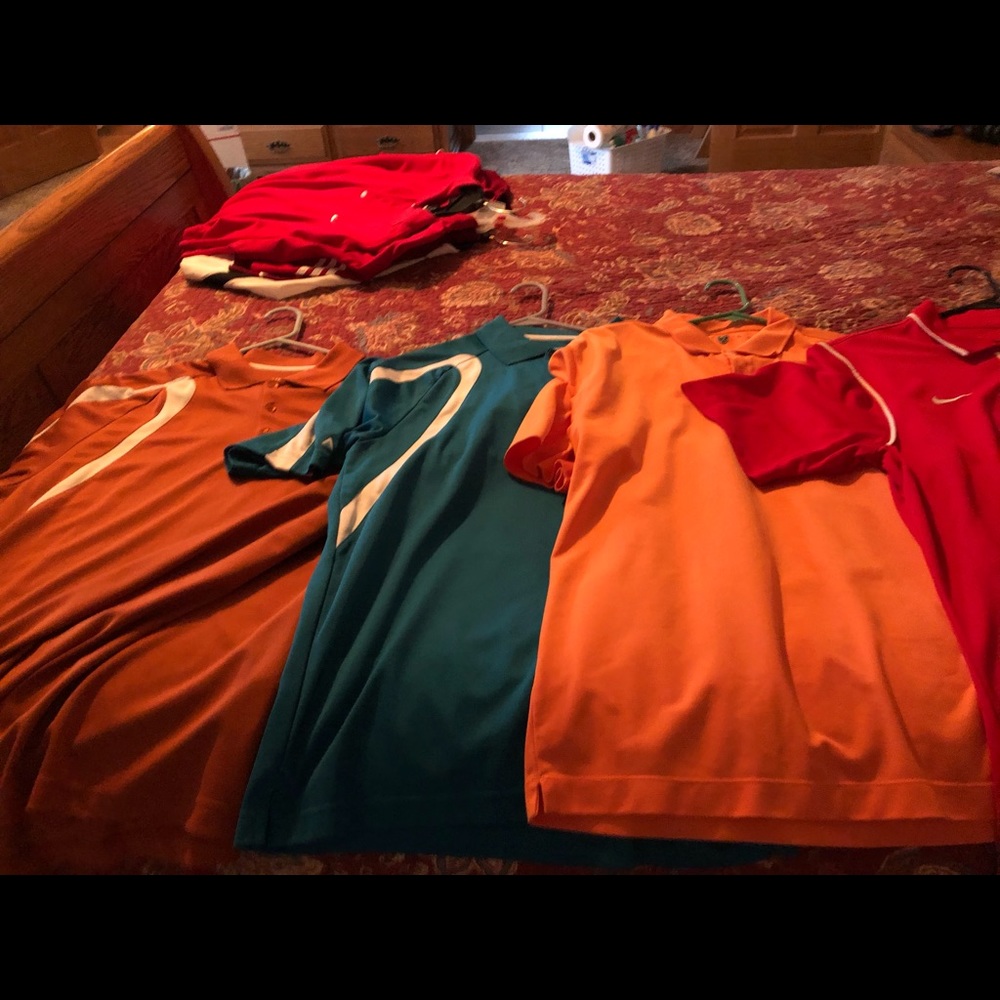 4 golf polos 2 are Antigua and 2 Nike